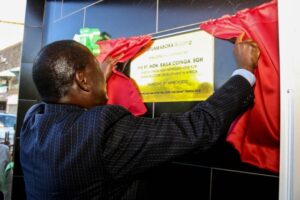 Raila unveils plaque at NyumbaBora